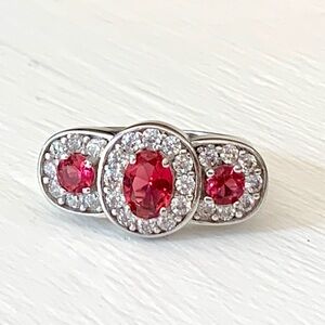 Elegant Silver and Red Gemstone Ring